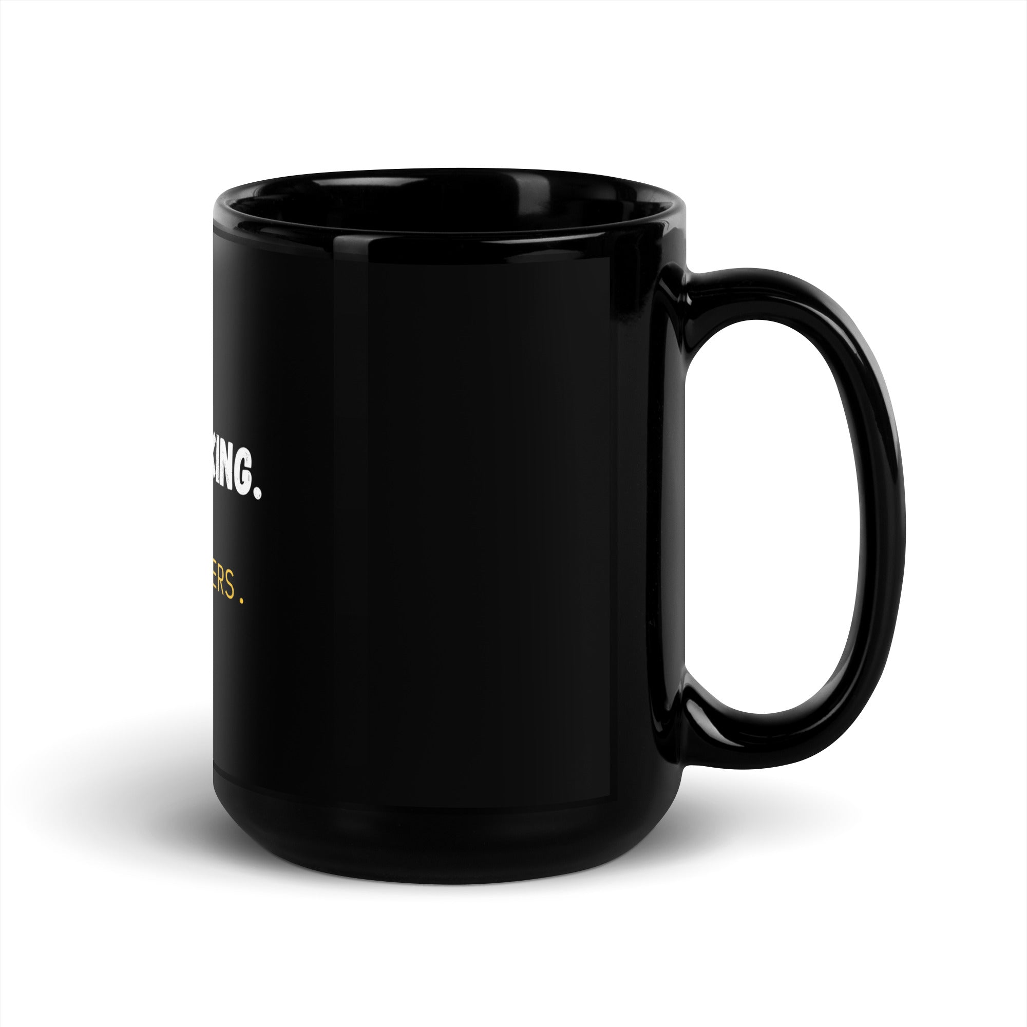 Teacher holding black Stop Barking I'm Grading Papers coffee mug at desk