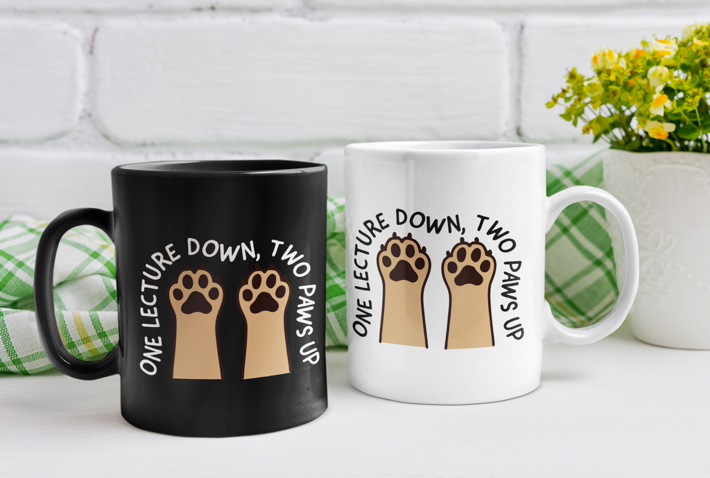 Black mug "One Lecture Down, Two Paws Up"