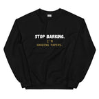 Close-up of white Stop Barking I'm Grading Papers text on navy sweatshirt chest