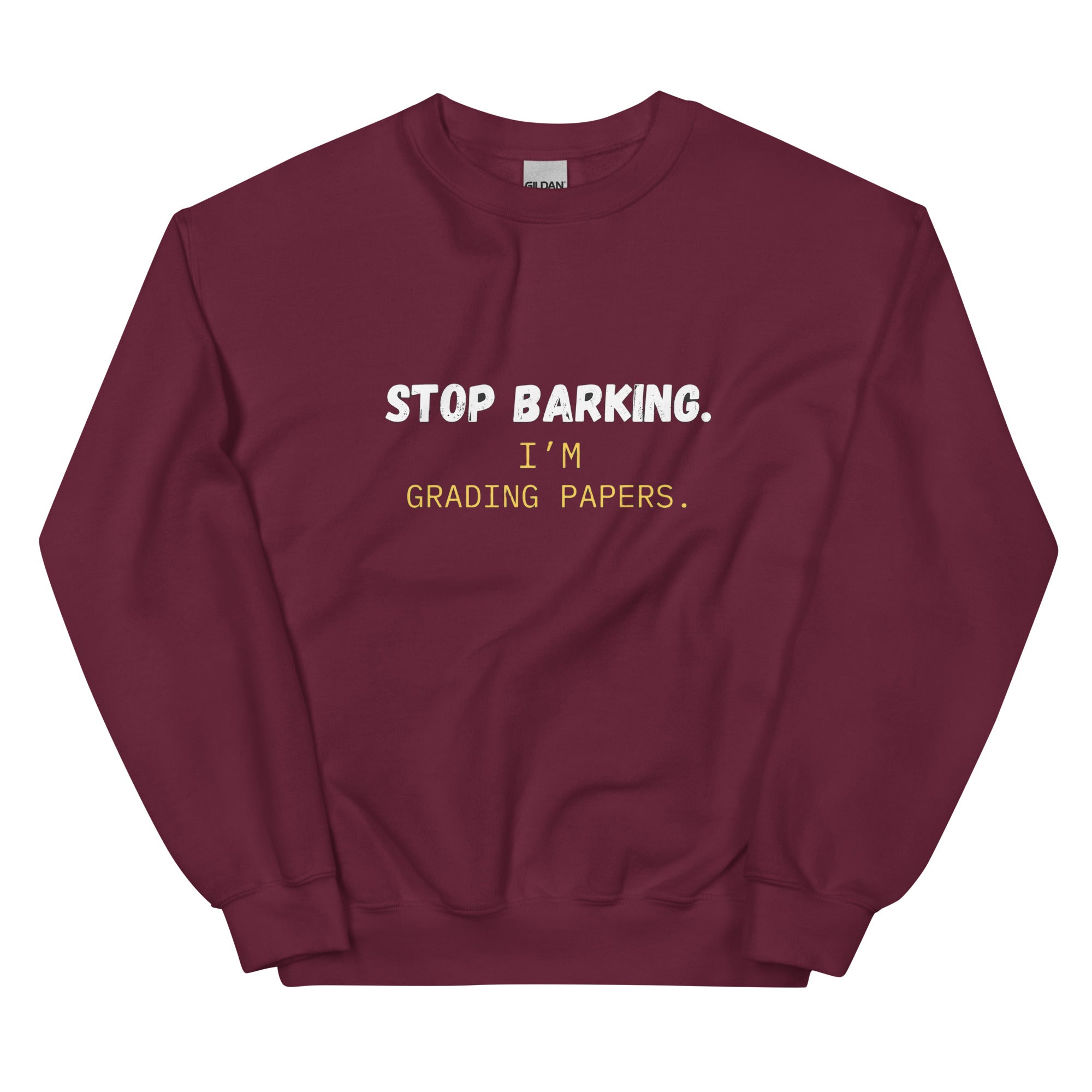 Navy teacher sweatshirt laid flat showing Stop Barking design and crew neck style red
